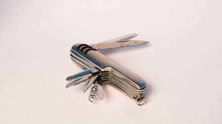 utility tool knife isolated on whiteの写真素材