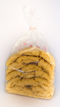 raw vermicelli chinese style in package with isolated on whiteの写真素材