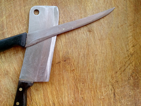vintage cutting board with knife on planks food background conceptの写真素材