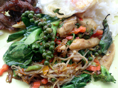 Fried herbal vegetables & Fried Pock & Fired Egg with Riceの写真素材
