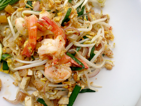 Delicious rice noodles with shrimp close-up on a plate.の写真素材
