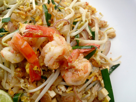 Delicious rice noodles with shrimp close-up on a plate.の写真素材