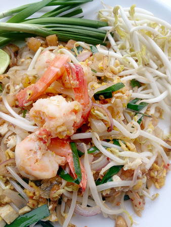 Delicious rice noodles with shrimp close-up on a plate.の写真素材