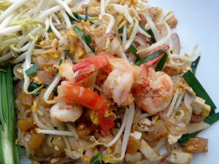 Pad Thai, stir-fried rice noodles with shrimp. The one of Thailand's national main dish. the popular food in Thailand. Thai Fried Noodlesの写真素材