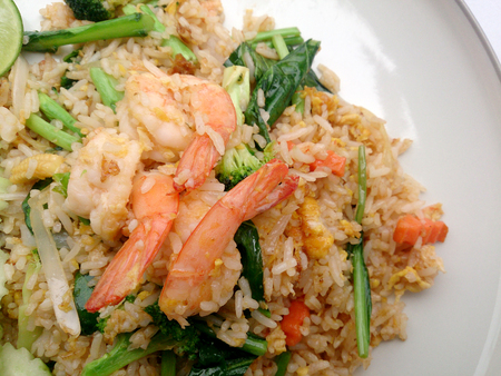 Fried rice with shrimp on the white dishの写真素材