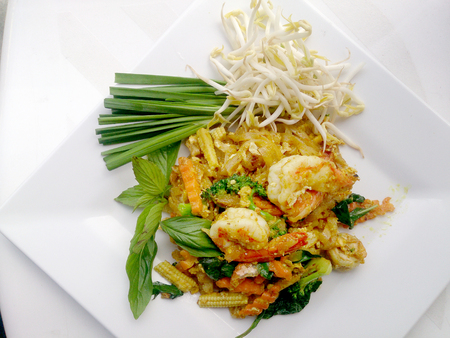 Pad thai noodles style with Green Curry and Prawns. Thai food style.の写真素材