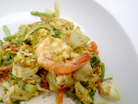 Thai Crab Curry Recipe - The fired curry shrimp and squid, mix seafood with mix vegetable. Phat phong kari in Thai, Thai Food.の写真素材