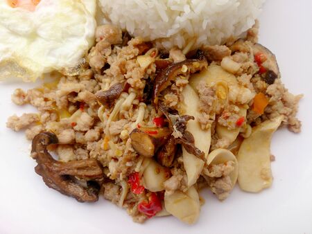 Stir fried mix mushroom with mince pork and mix vegetable.の写真素材