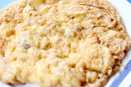 Minced pork in omelette,It's popular traditional Thai style food,の写真素材