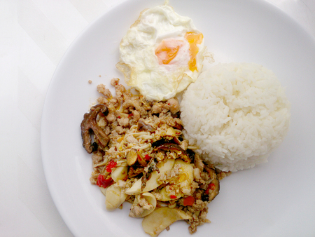 Stir fried mix mushroom with mince pork and mix vegetable.の写真素材