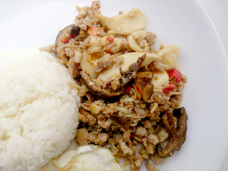 Stir fried mix mushroom with mince pork and mix vegetable.の写真素材