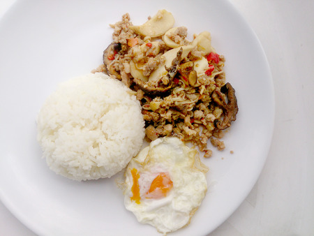 Stir fried mix mushroom with mince pork and mix vegetable.の写真素材