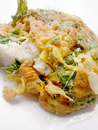 Traditional Thai style, Omelet on Thai Jasmine Rice on white dishの写真素材