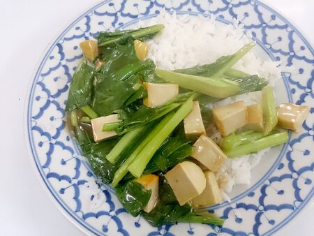 Fried tofu with Chinese broccoli &  thai jasmine rice,  Vegetarian Food, healthy foodの写真素材