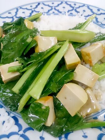 Fried tofu with Chinese broccoli &  thai jasmine rice,  Vegetarian Food, healthy foodの写真素材