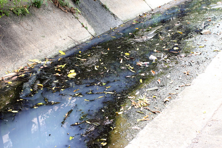 Toxic water running from sewers in dirty underground sewer for dredging drain tunnel cleaningの写真素材