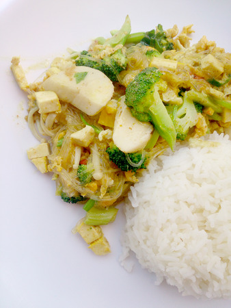 Vegetarian Food with fried mixed vegetables with noodles made of green grams & thai jasmine rice, Healthy food. thai foodの写真素材