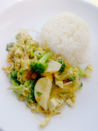 Vegetarian Food with fried mixed vegetables with noodles made of green grams & thai jasmine rice, Healthy food. thai foodの写真素材