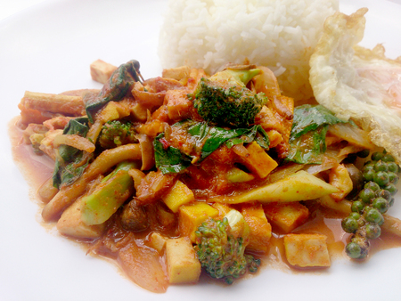 Fried vegetables and Tofu with Chilli Curry, Hot and Spicy Vegetarian Food in white dish on white background, Healthy Food. Thai Foodの写真素材