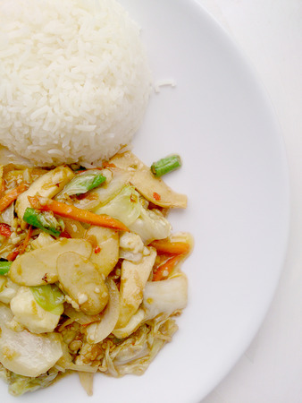 Vegetarian Food with Fried Vegetables and Tofu on white dish, Healthy foodの写真素材