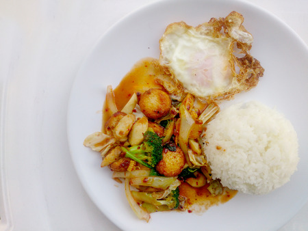 Fried tofu with mixed vegetables in white dish isolate on white background. Vegetarian Food, Healthy food.の写真素材