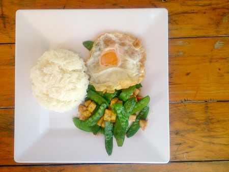 stir-fried a Fresh green peas with tofu on white plate. Vegetarian Food, healthy food.の写真素材