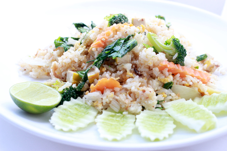 fried rice with vegetable on the white plate with withe background. Vegetarian Food, healthy food, Thai cuisineの写真素材