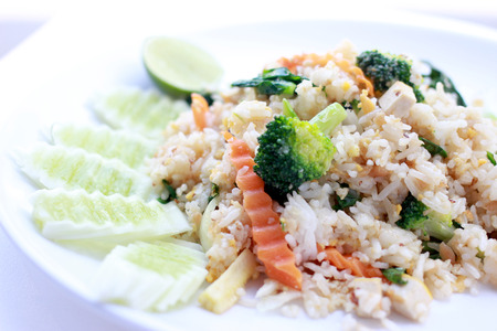 fried rice with vegetable on the white plate with withe background. Vegetarian Food, healthy food, Thai cuisineの写真素材