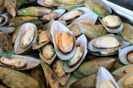 Moules Marinieres - Mussels cooked with white wine sauce.  Luxury restaurant menu photo, mediterranean cuisine, seafood meal conceptの写真素材