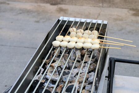 Grilled meatballs on the stove. Thai Street Food .