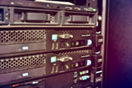 blurred image of severs computer in a rack at the large data center.の写真素材