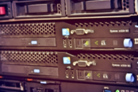 blurred image of severs computer in a rack at the large data center.の写真素材