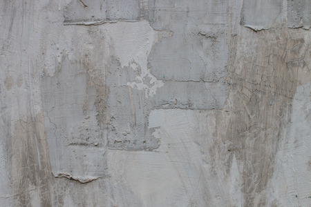old grungy texture, wet grey concrete wall. Raw plaster wall background. Asphalt close-up. vintage tone filterの写真素材