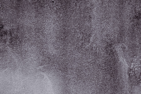 old grungy texture, wet grey concrete wall. Raw plaster wall background. Asphalt close-up. vintage tone filterの写真素材