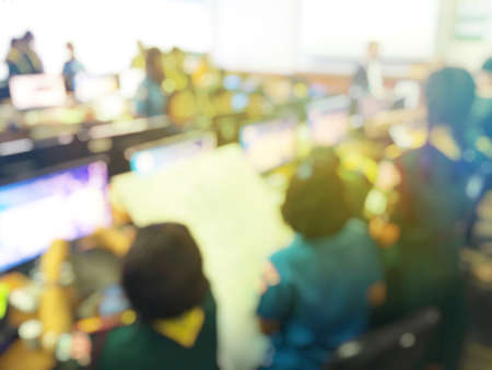 Education concept, blurred image of the student learning technology and workshop using computer together in computer room in secondary, university for study, Network communication, training concept.の写真素材