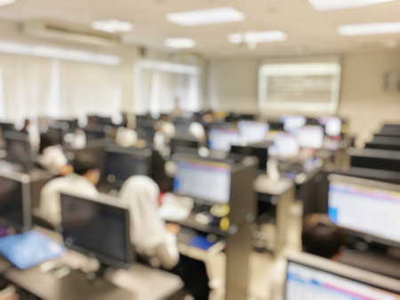 Education concept, blurred image of the student learning technology and workshop using computer together in computer room in secondary, university for study, Network communication, training concept.の写真素材