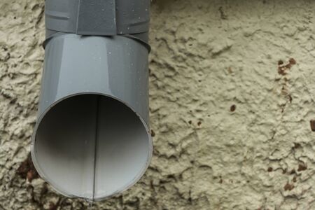 downspout close-up during a light rainの写真素材