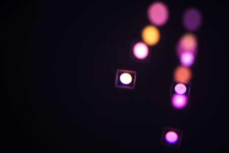 colored lights, abstract black background