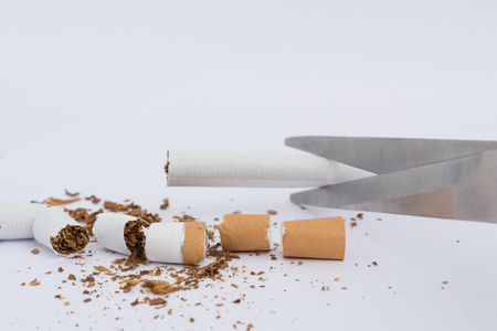 no smoking, scissors cut a cigarette, broken up tobackの写真素材