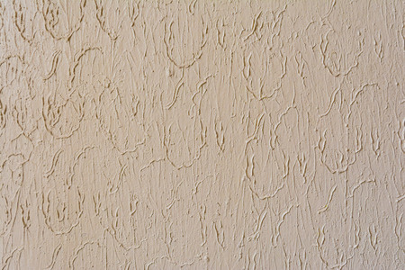Texture of painted plaster wall relief inside, abstract background