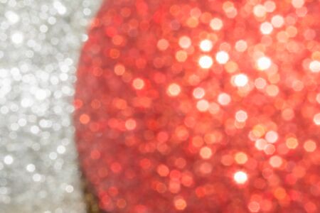 silver red blurred sparkling festive abstract background based on Christmas ballsの写真素材