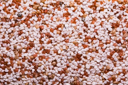 texture decorative plaster on the basis of small colored marble stones and acrylic adhesive composition, close-up abstract backgroundの写真素材