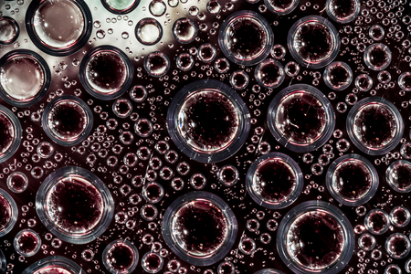 drops of water on a transparent surface, dark abstract backgroundの写真素材