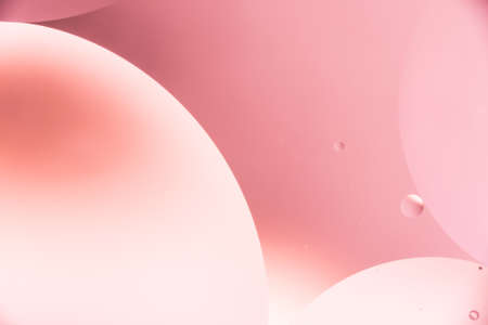mixing water and oil, beautiful color abstract background based on circles and ovals, macro abstractionの写真素材