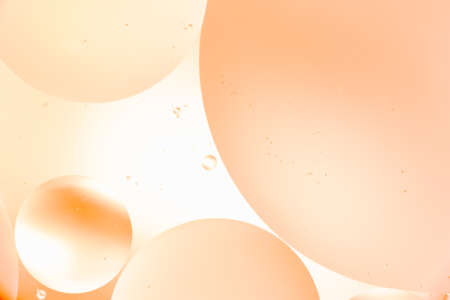 mixing water and oil, beautiful color abstract background based on circles and ovals, macro abstractionの写真素材