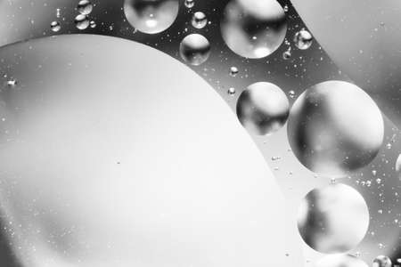 mixing water and oil, beautiful color abstract background based on circles and ovals, macro abstractionの写真素材