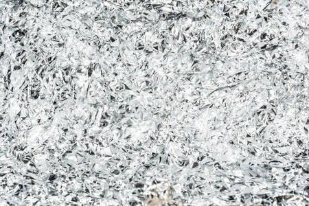 crumpled foil, close-up abstract background