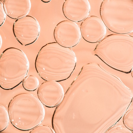 drops of water on the surface of the oil, variation of dissimilar liquids, macro art abstract backgroundの写真素材