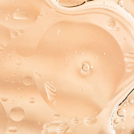 drops of water on the surface of the oil, variation of dissimilar liquids, macro art abstract backgroundの写真素材