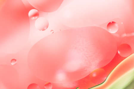 mix oil and water, color background with soft defocusing, macro abstract